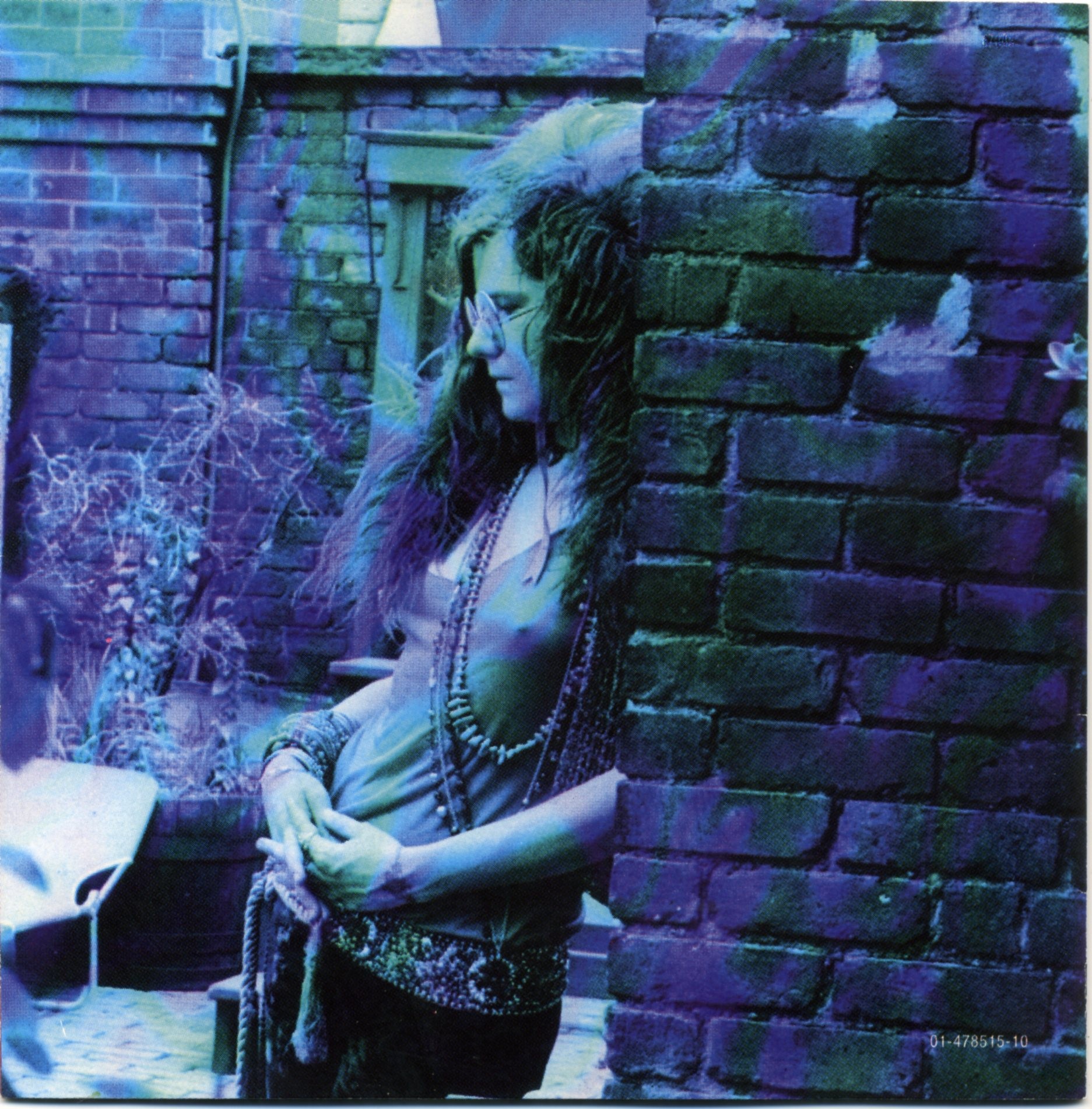 Janis Joplin 18 Essential Songs frontinside.jpg.
